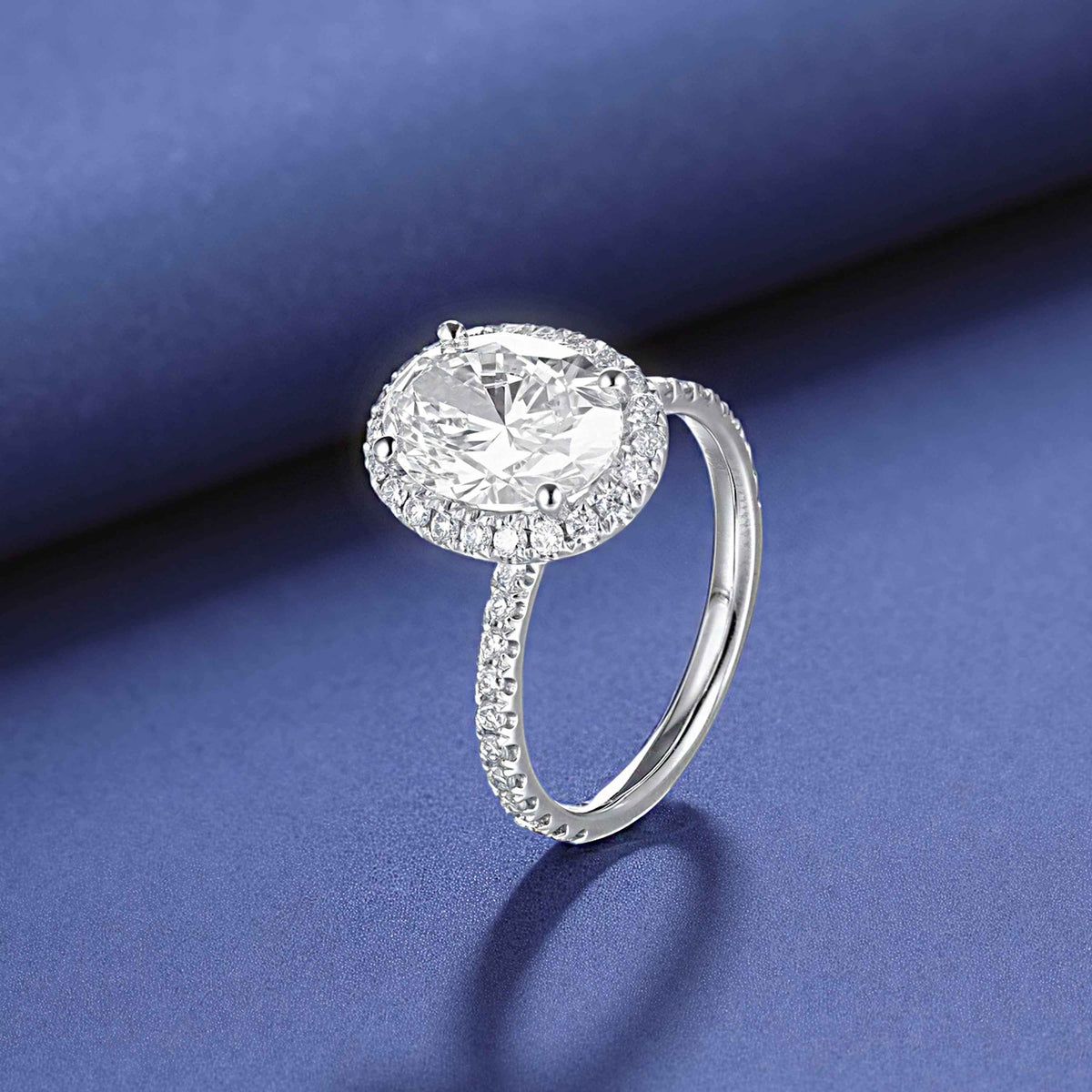 Ceylon Oval Cut Lab Grown Diamond Platinum Halo 0.5ct Ring