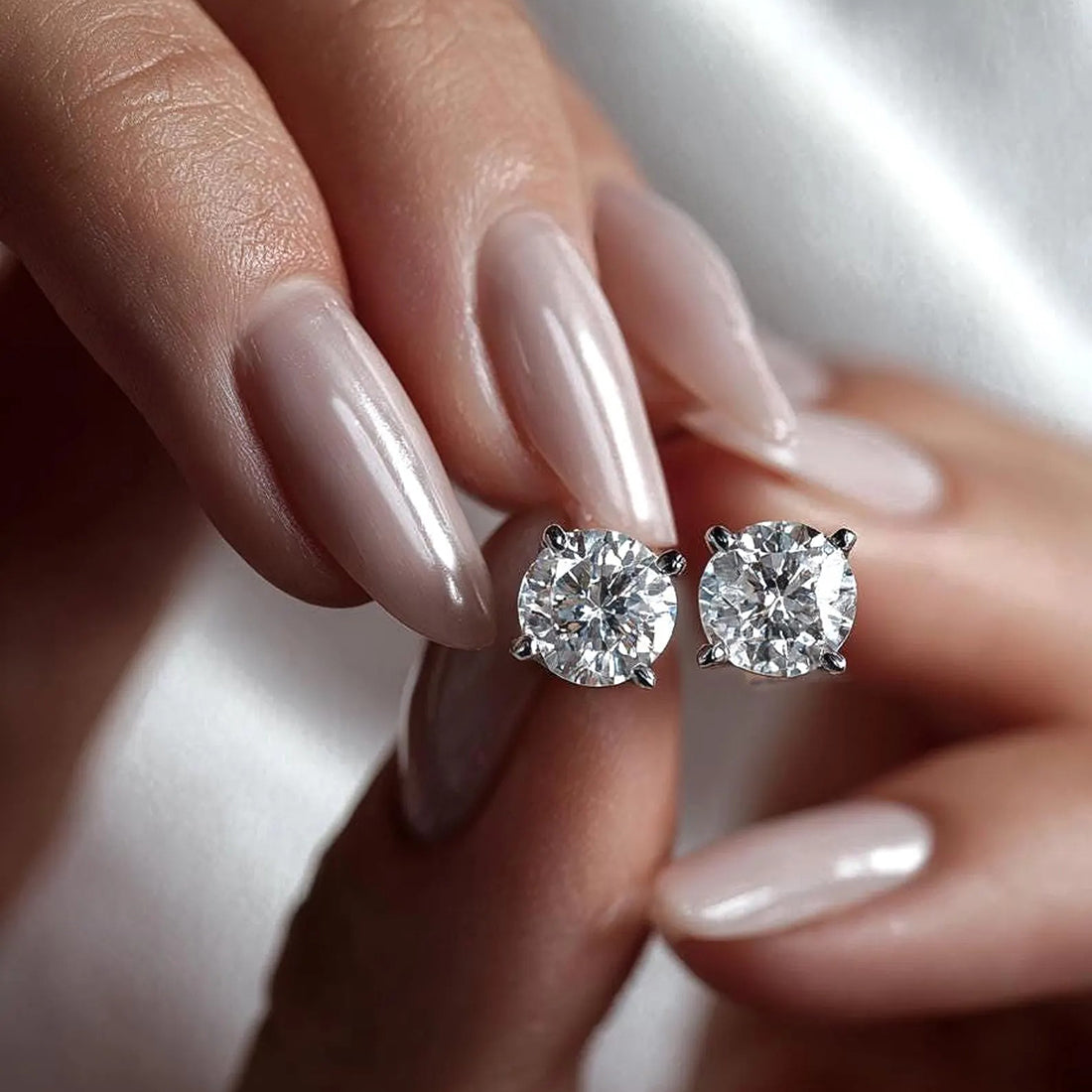 Ceylon Round Cut Moissanite Sterling Silver 4-Prong Stud Earrings