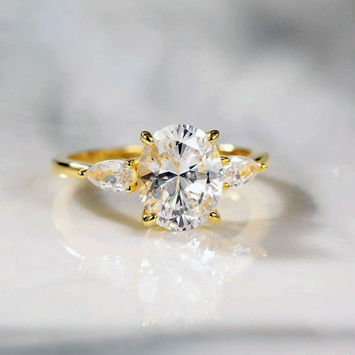 Ceylon Oval Moissanite Three Stone Sterling Silver Ring